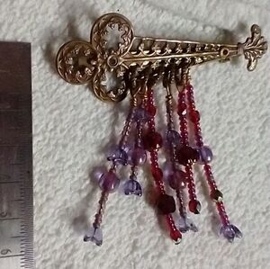 Goldtone purple red decorative dangle tassel beads brooch